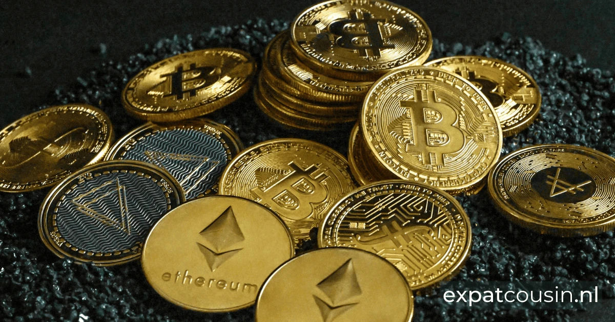 A pile of gold and silver crypto coins sitting on top of black gravel.
